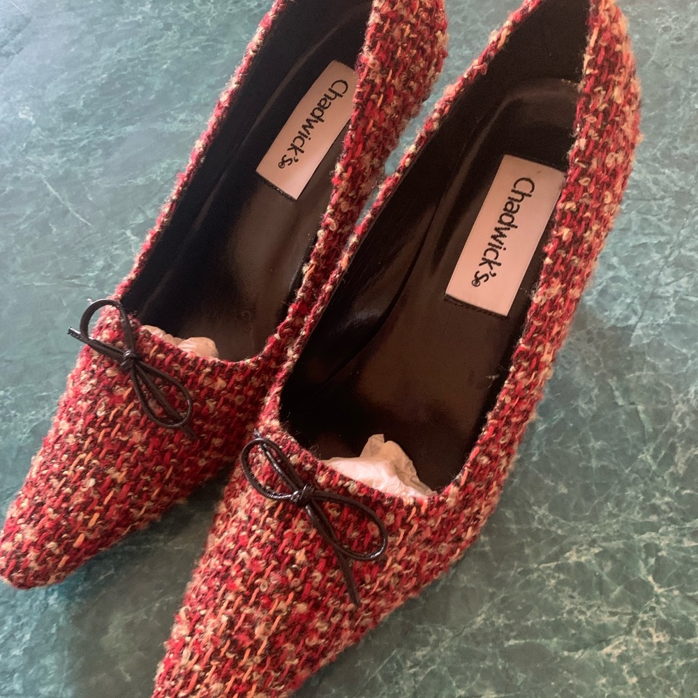 Ladies red variegated high heels with black bow and black 3” heels